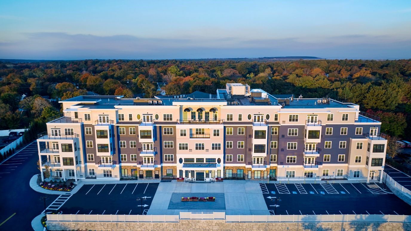 Aerial view of the facility building with surrounding landscape