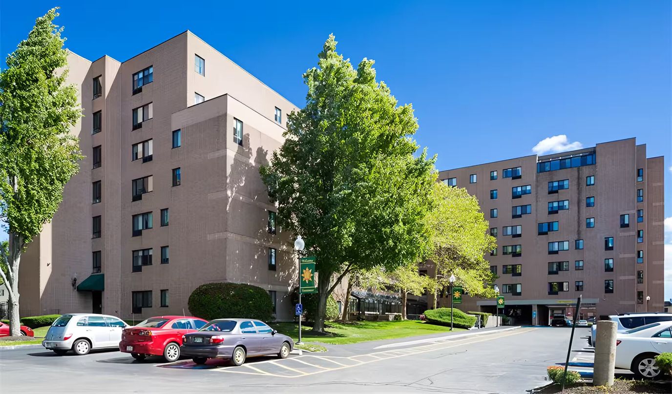 Exterior view of the Peabody House building and parking area