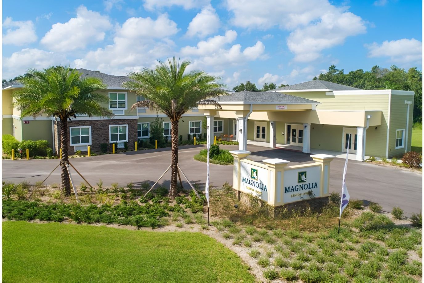 Exterior view of Magnolia Senior Living with landscaping