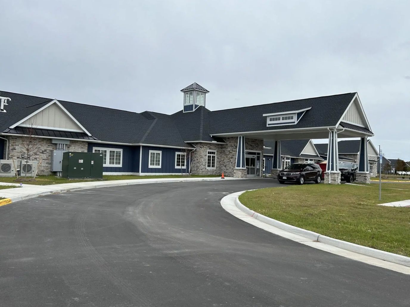Exterior view of Hampton Manor building entrance