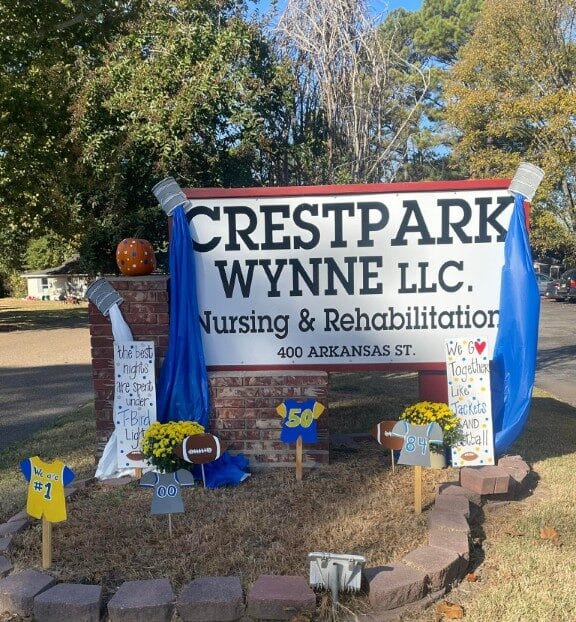 Crestpark Wynne facility sign with decorations