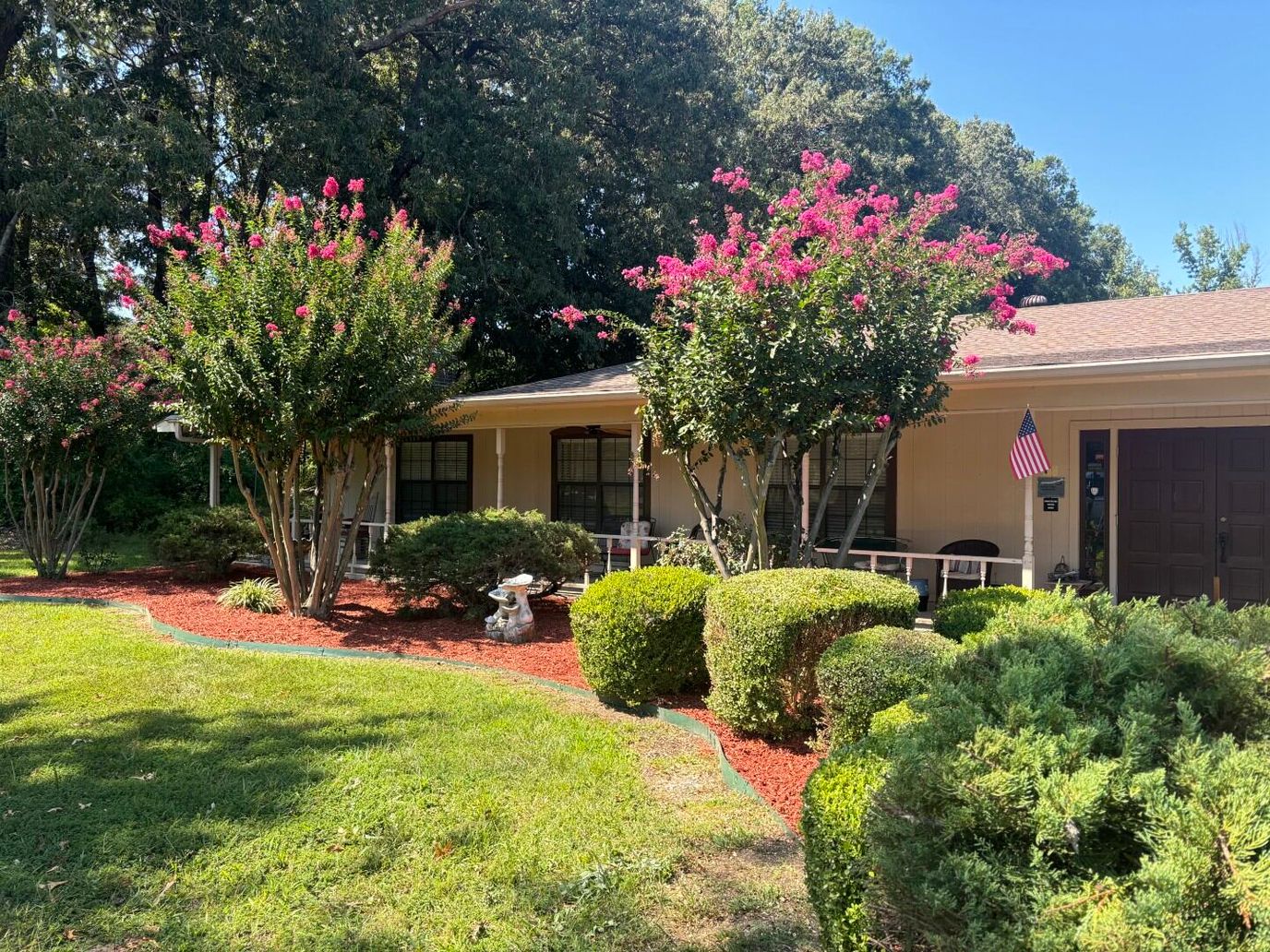 Exterior view of Jacksonville Care Center surrounded by trees and landscaping
