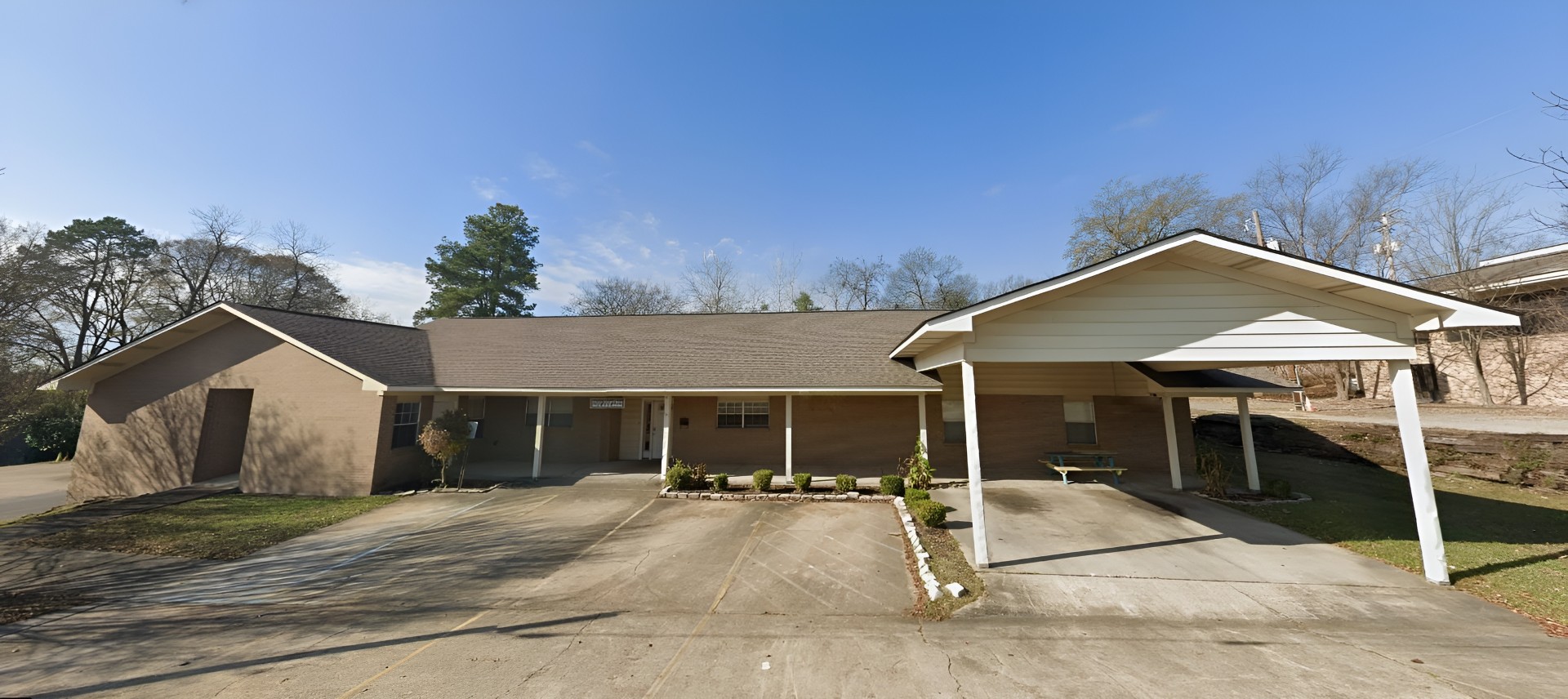 Exterior view of a one-story assisted living facility
