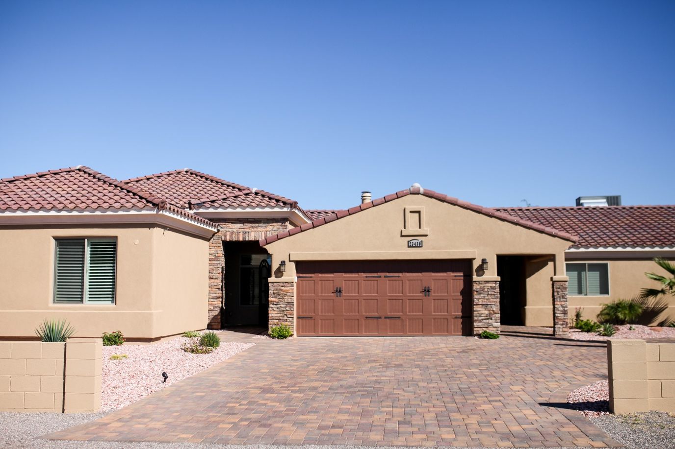 Exterior view of an assisted living facility with landscaping