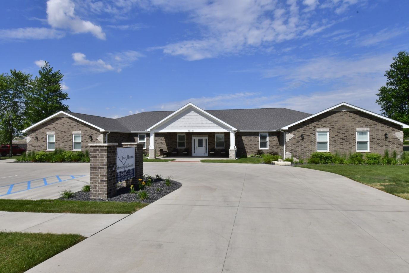 Exterior view of Two Hearts Homes for Seniors building