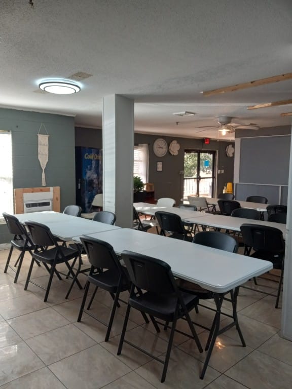 Interior view of a common area with dining tables
