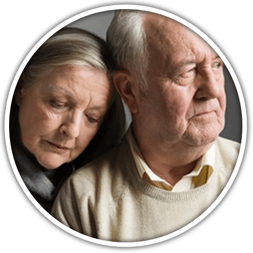 An elderly couple sharing a quiet moment together.
