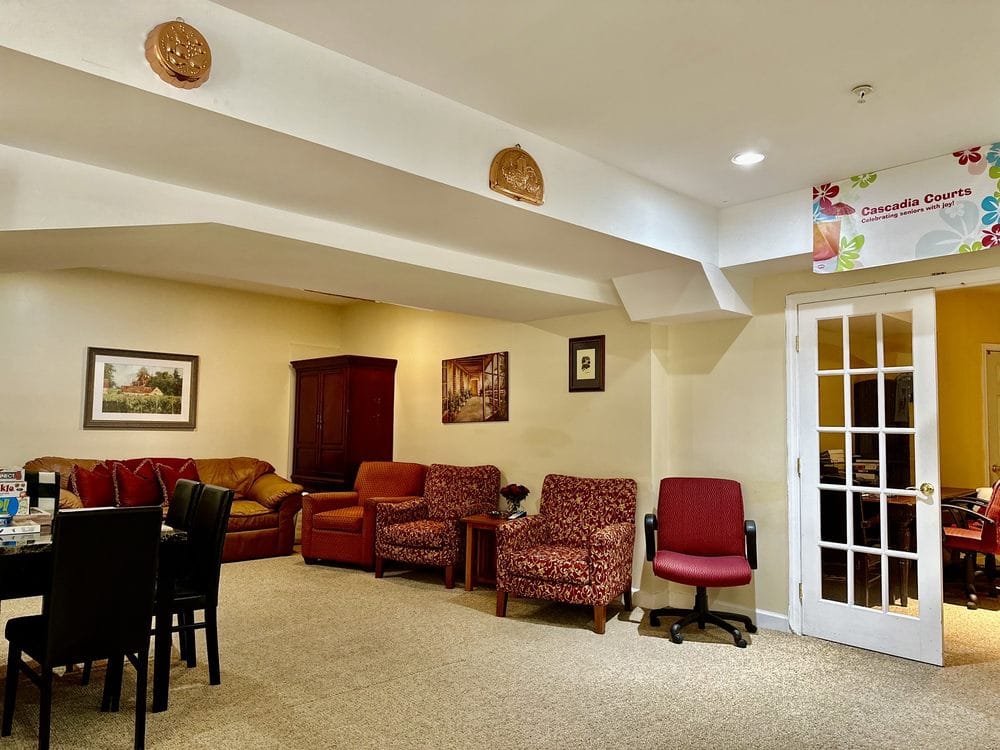 Cozy common area with seating at Cascadia Courts II