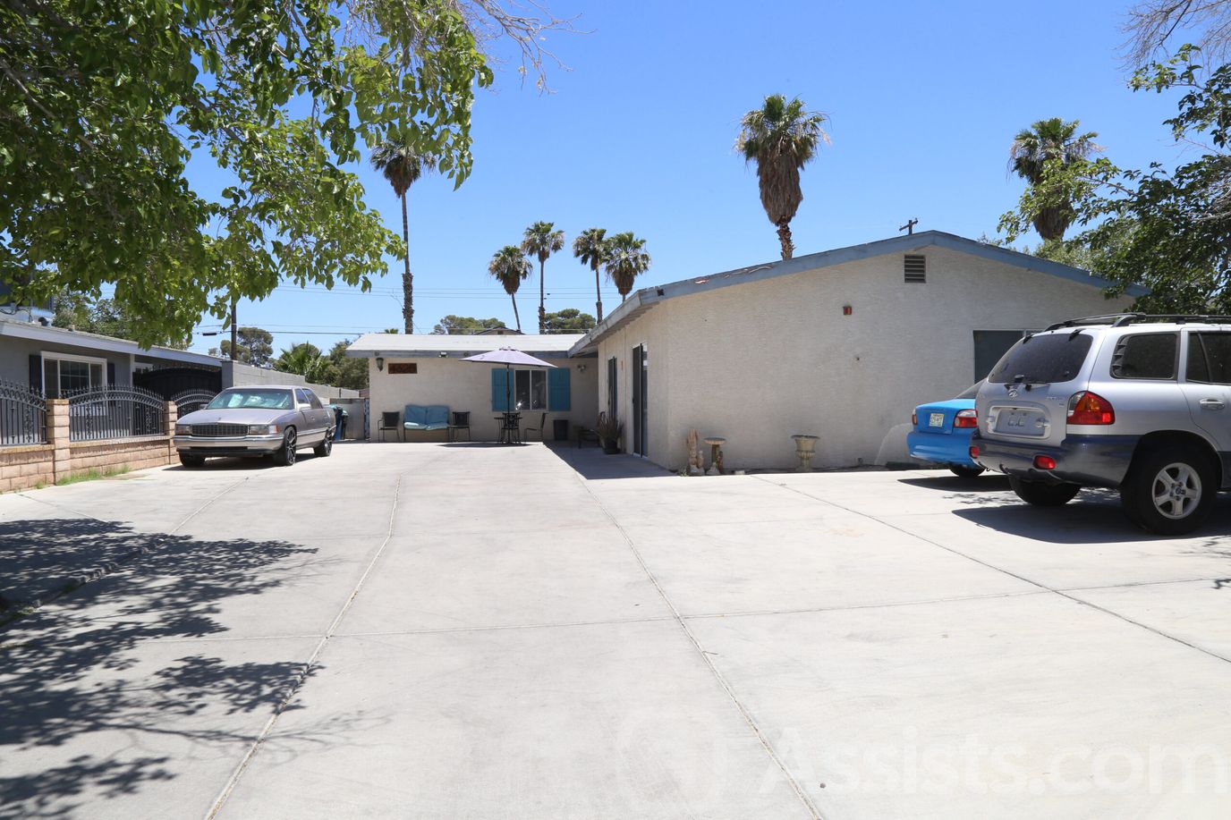 Exterior view of Lake Mead Care Home with vehicle parking
