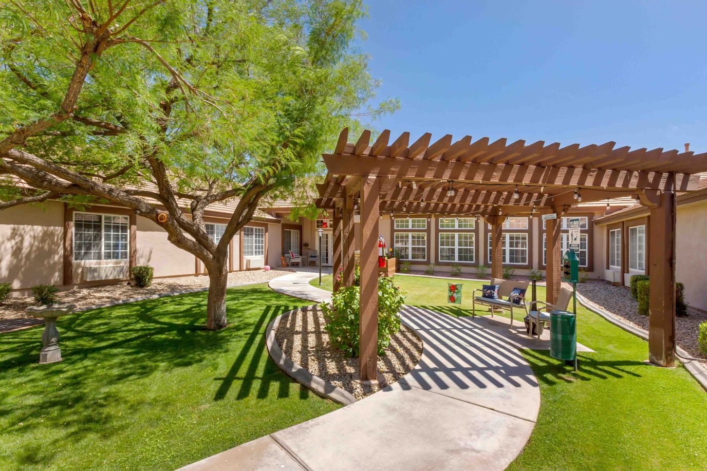 Outdoor courtyard with shaded seating area