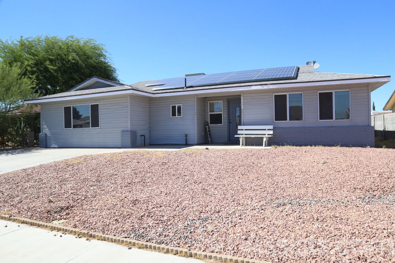 Exterior view of a senior care facility with solar panels