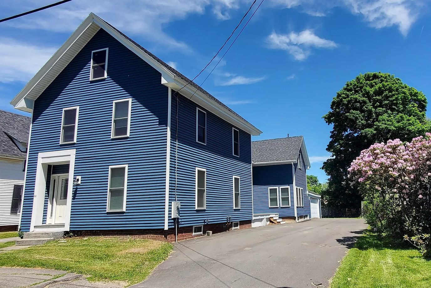Exterior view of a blue residential building