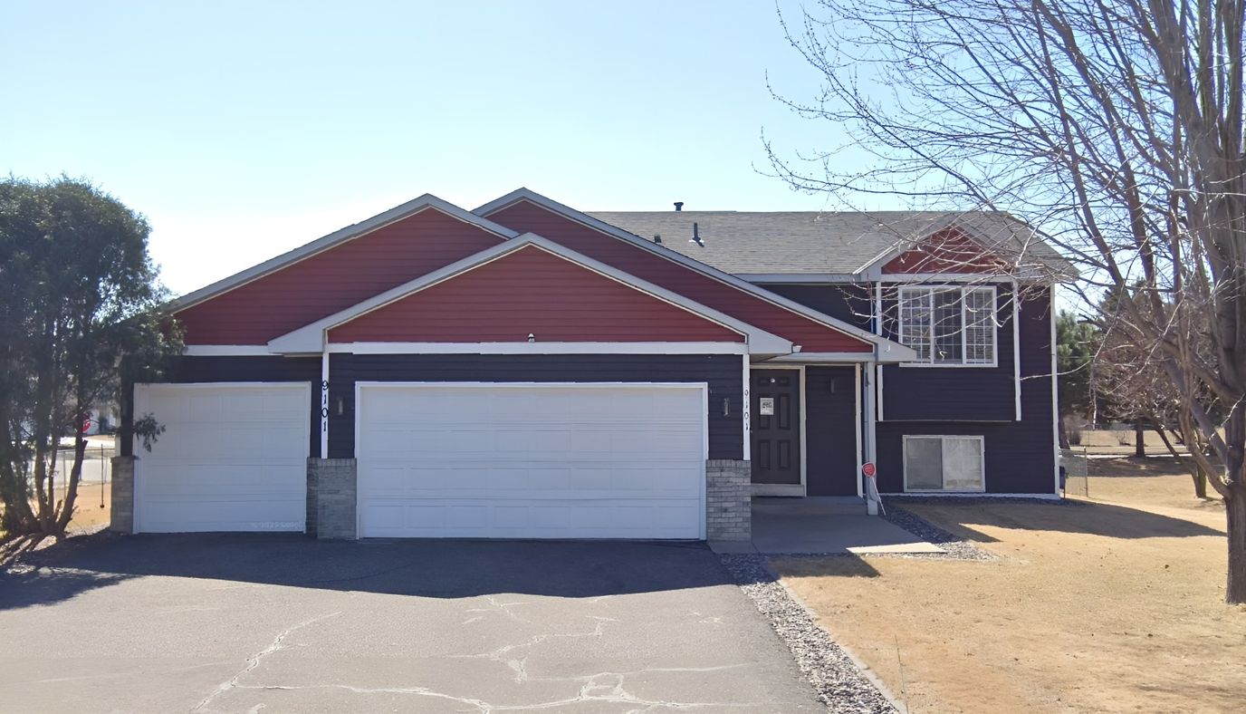 Exterior view of a building with garages