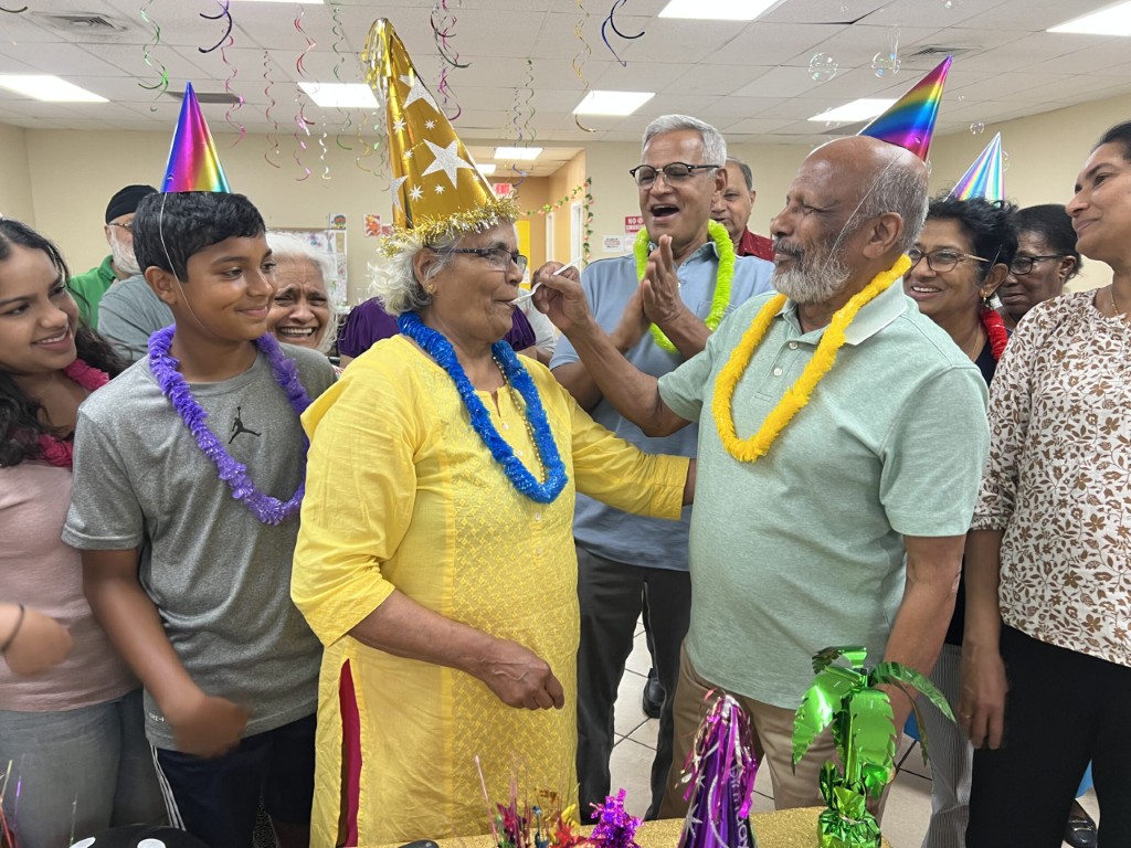 Residents and family celebrating at a party