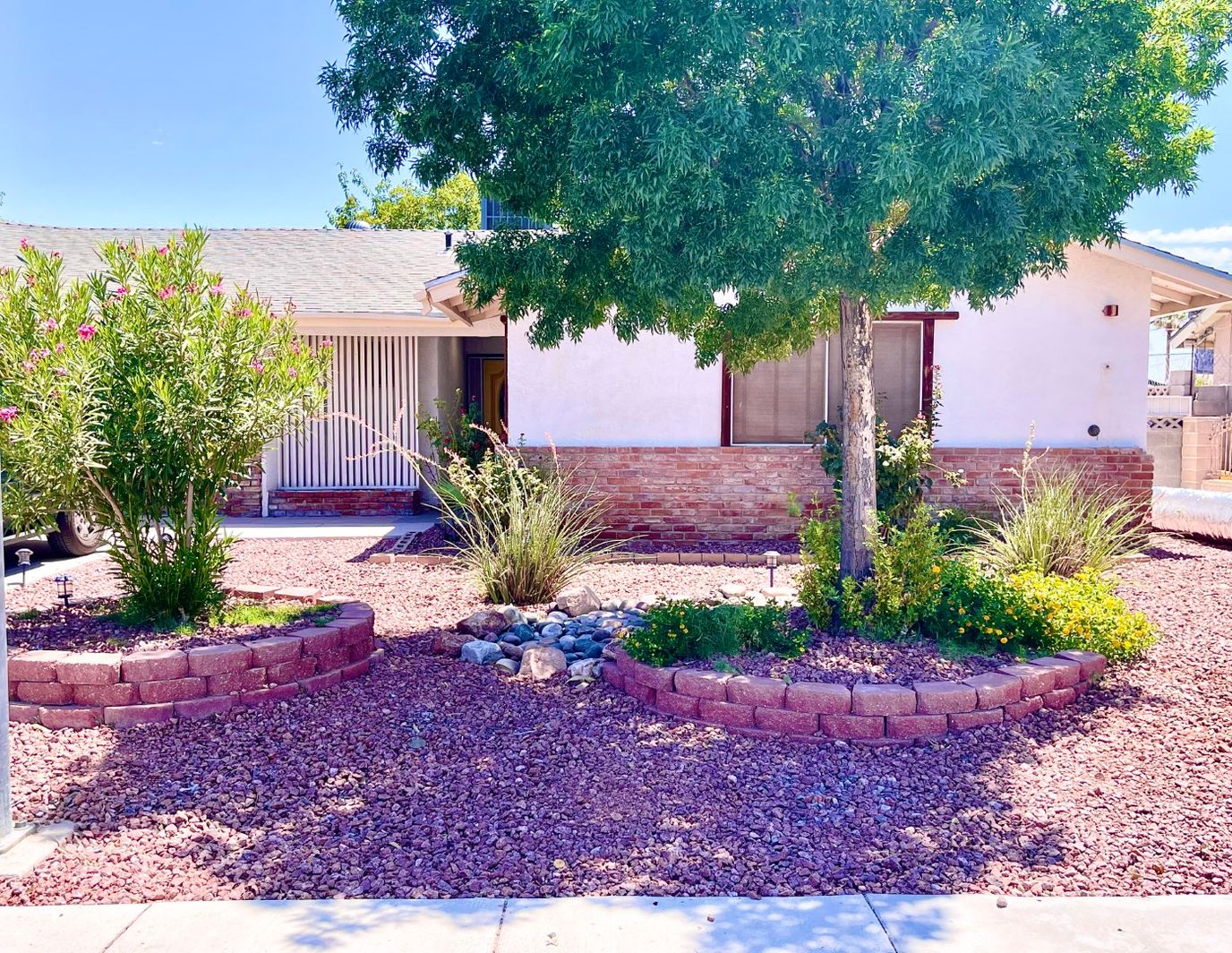 Exterior view of a landscaped front yard of a facility