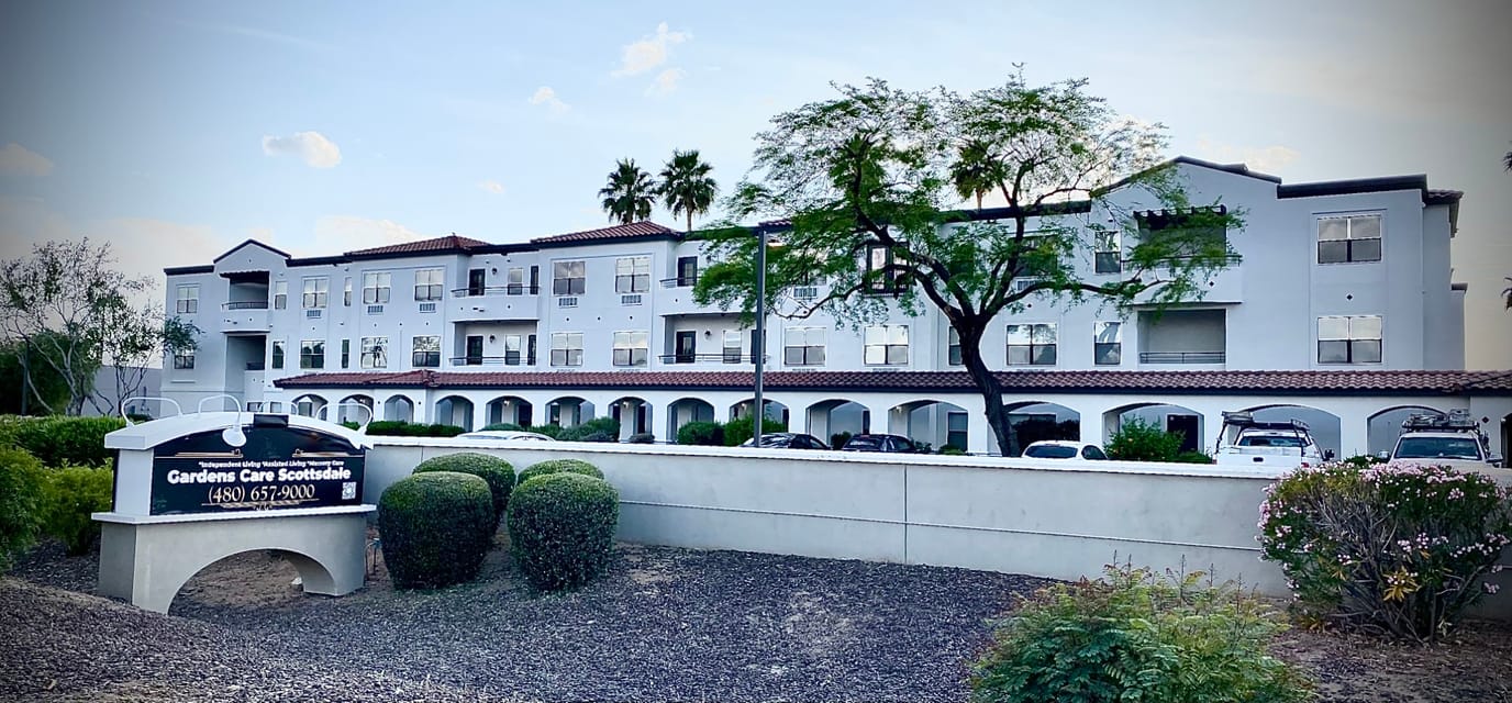 Exterior view of Gardens Care Senior Living building