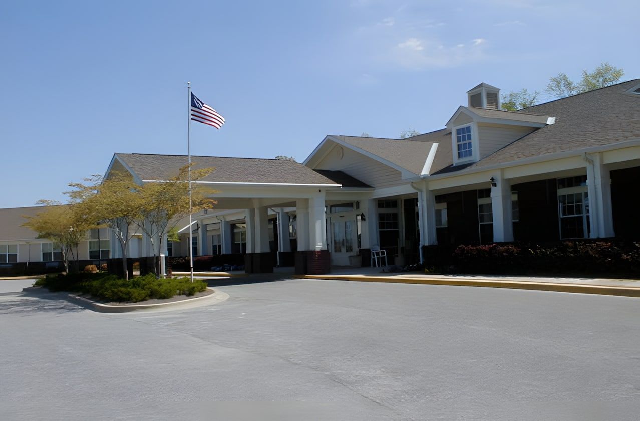 Exterior view of Camellia Place with flag and entrance
