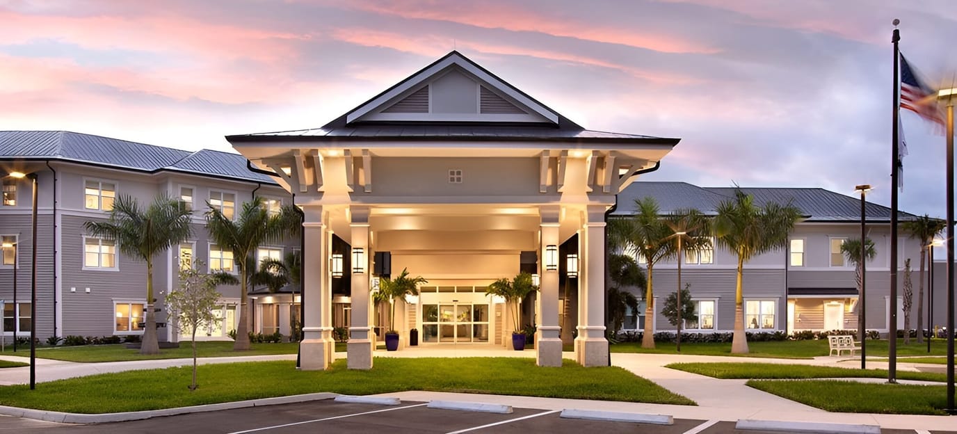 Exterior view of The Preserve in Fort Myers with well-lit entrance