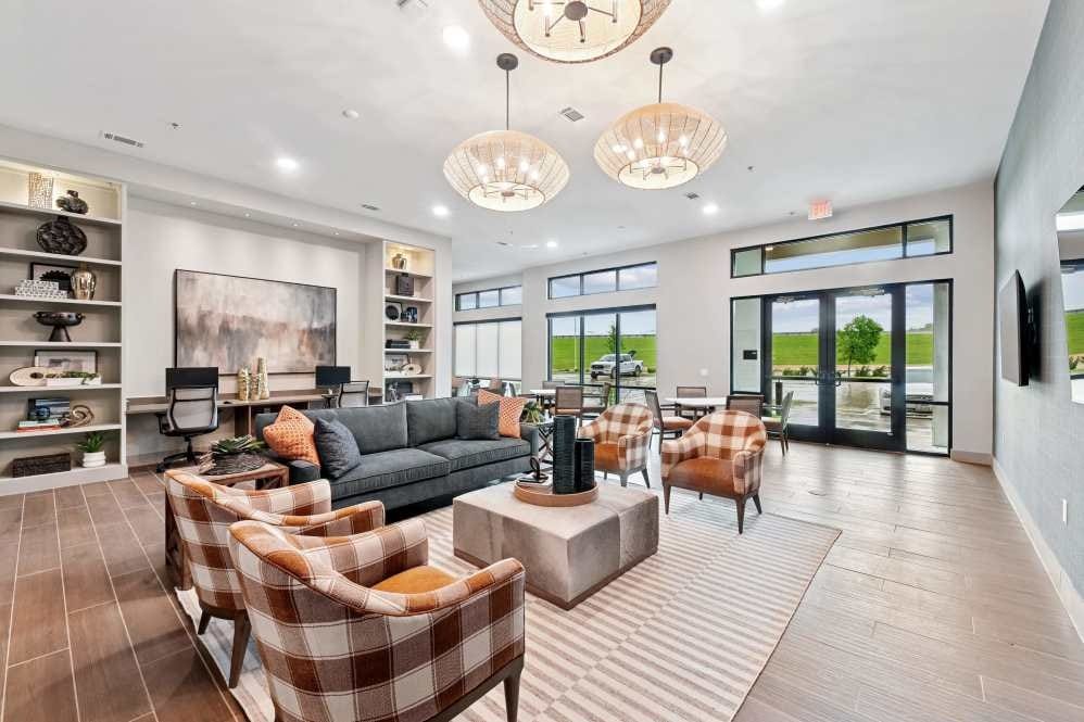 Bright common area with modern seating and decor