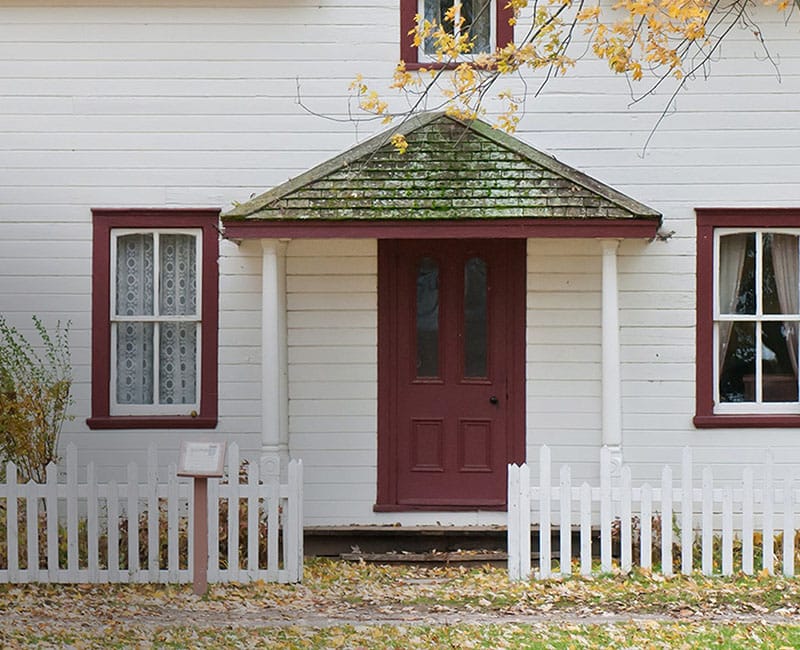 Front entrance of a welcoming residential building with porch