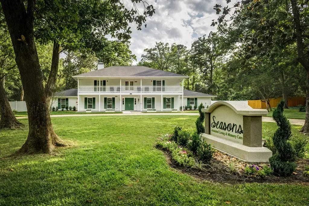 Exterior view of Seasons Assisted Living with landscaping