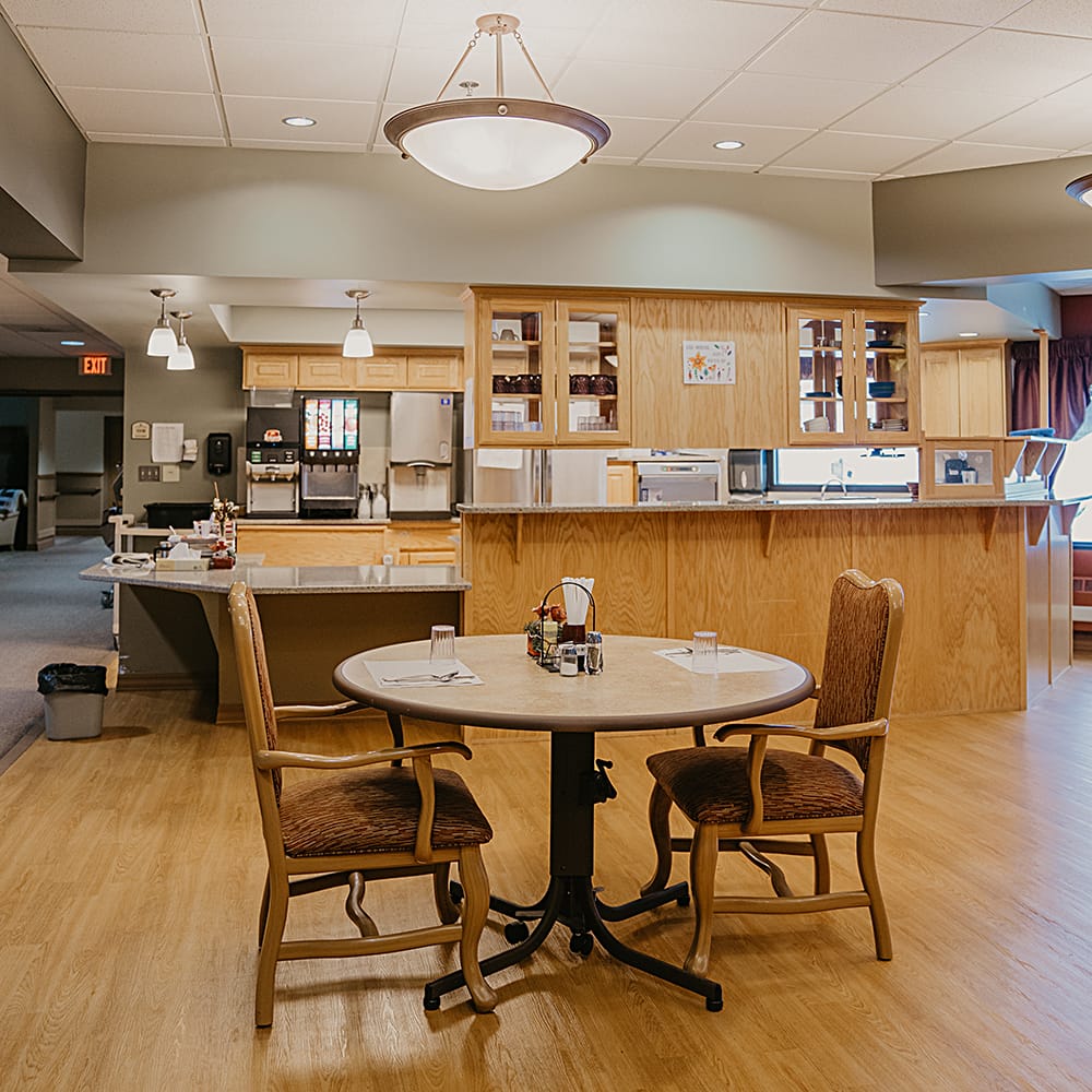 Bright dining area with table and chairs