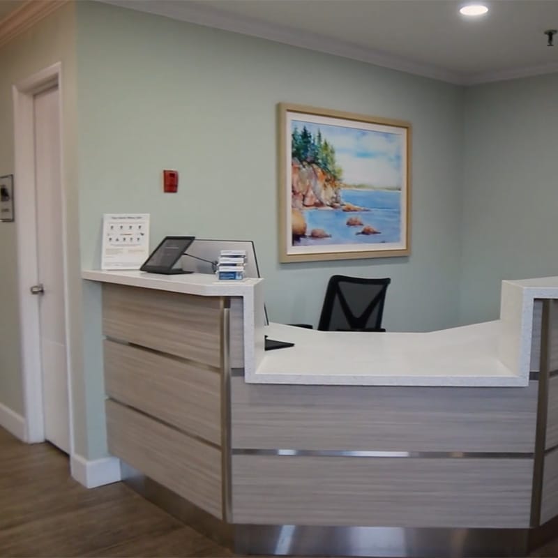 Reception area with a desk and artwork