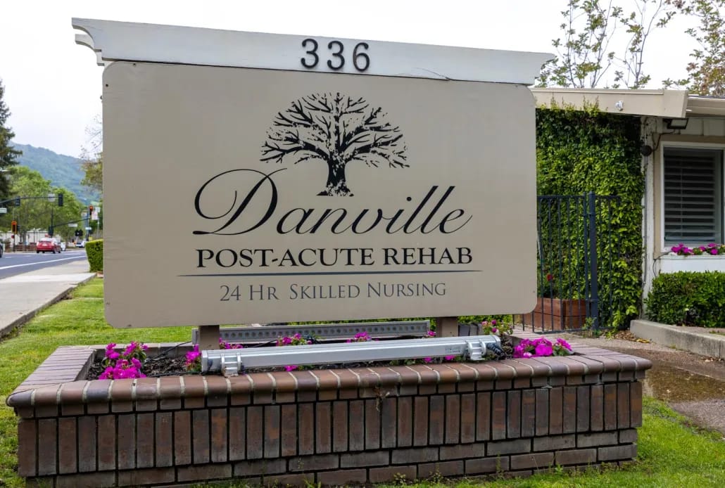 Facility sign displaying the name and services offered