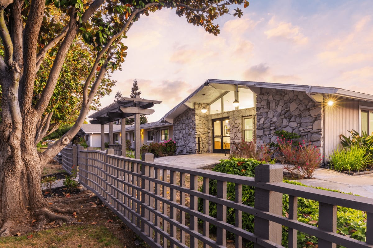Entrance of Sunnyvale Post-Acute Center with landscaping