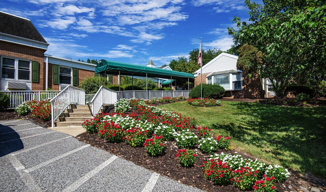 Exterior view of Brinton Manor with landscaped garden