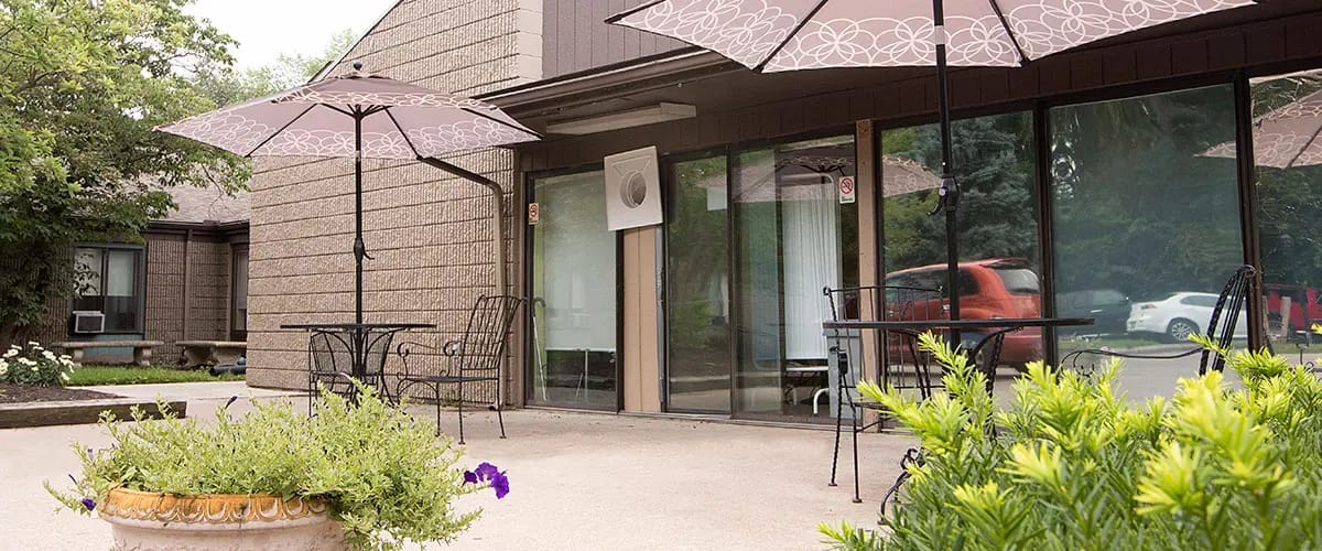 Outdoor seating area with umbrellas and tables