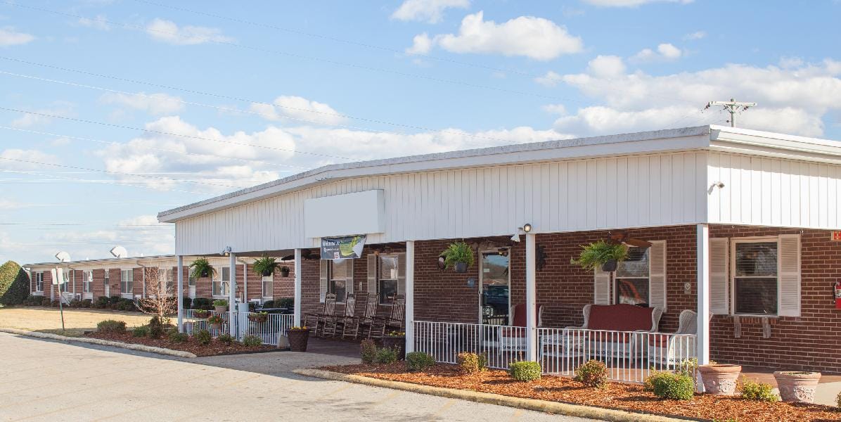 View of the facility's exterior with seating