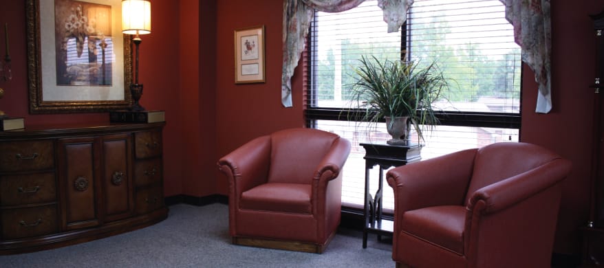 Cozy interior space with two armchairs and a window
