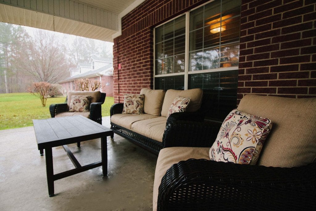 Cozy outdoor seating area with comfortable couches