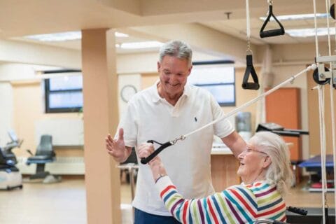 Senior resident participating in a therapy session