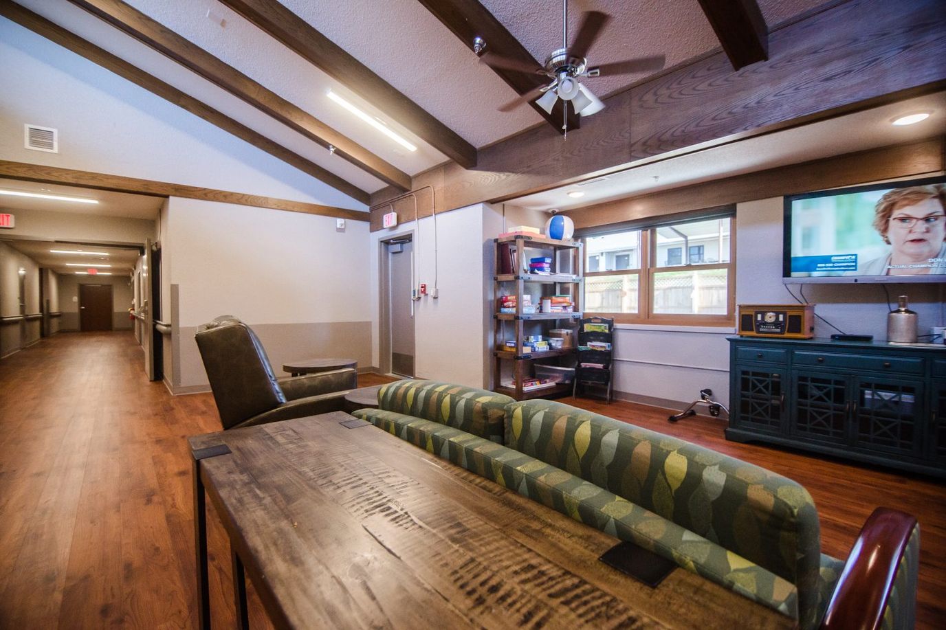 Cozy common area with seating and TV