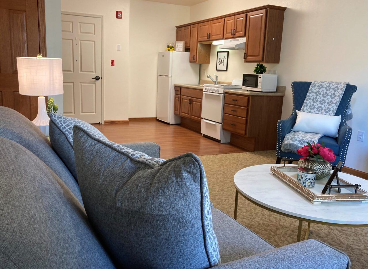Cozy living space with a kitchen area and sitting area