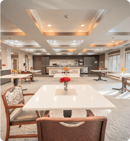 Interior view of a bright dining area with tables