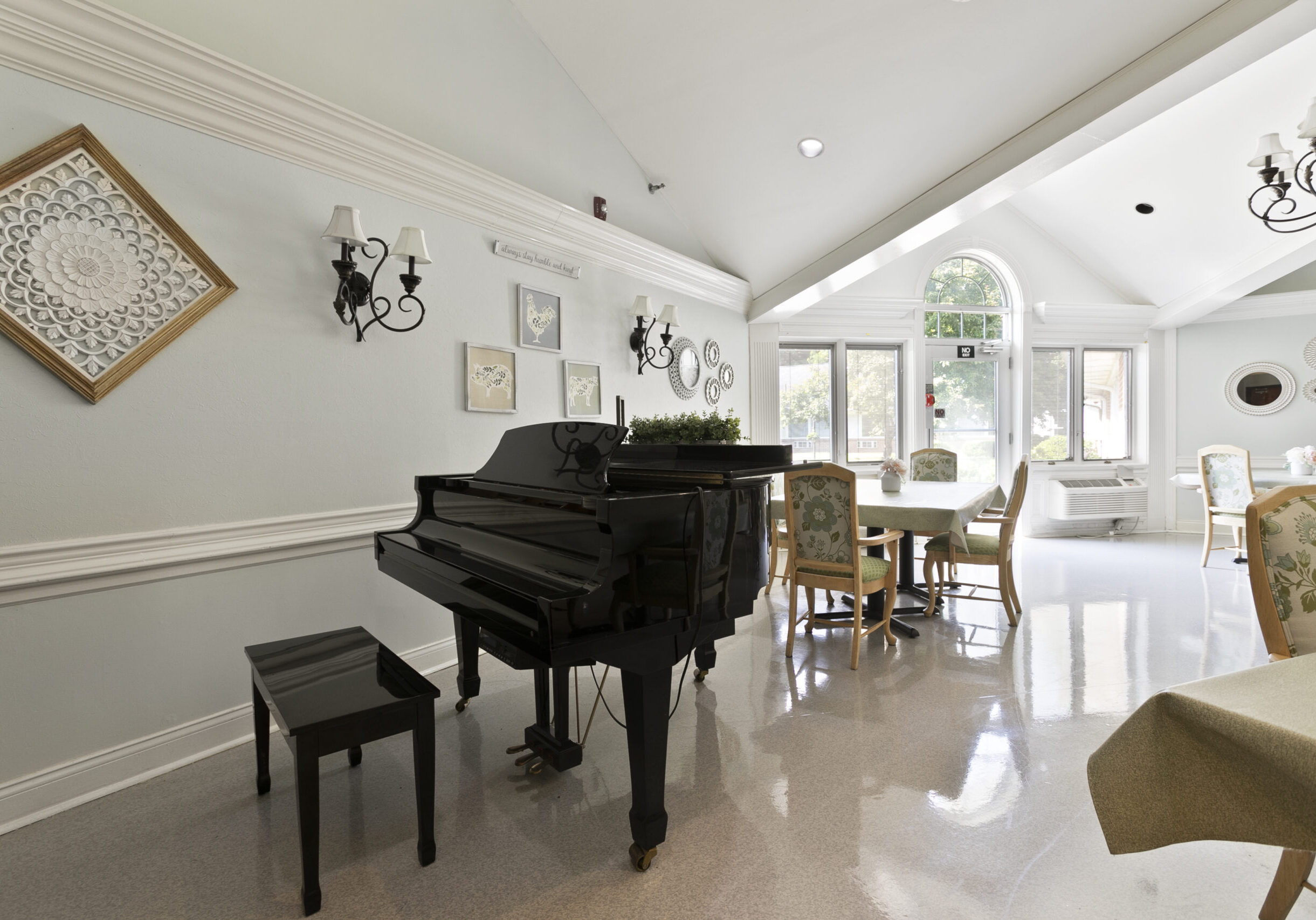 Interior view of a common area with a piano