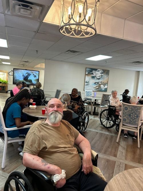 Princeton Place-Ruston, Nursing Home in Ruston, LA — Residents in wheelchairs socializing around a dining area