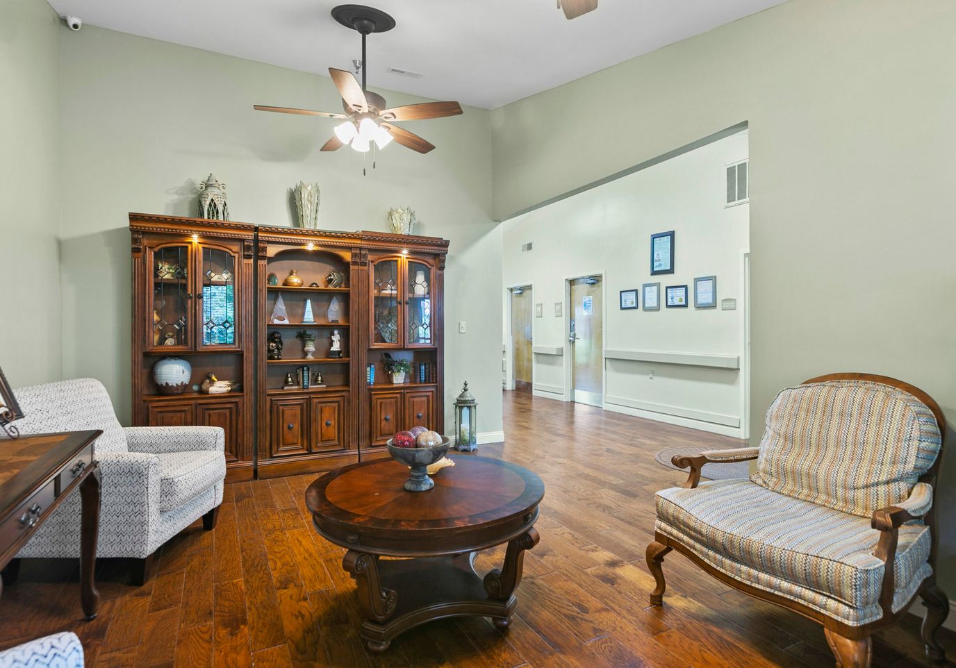 Interior common area with seating and decorative cabinet