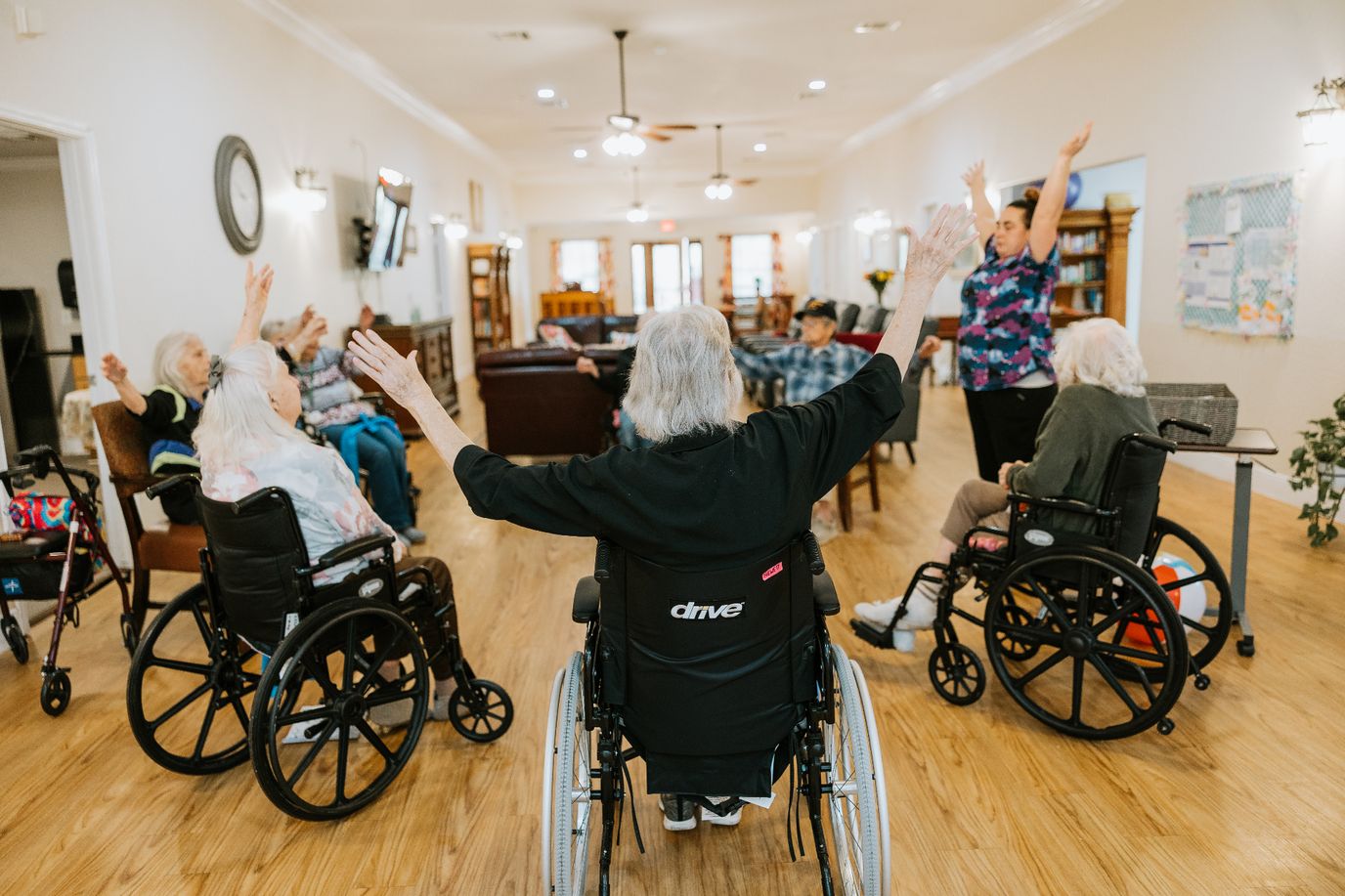 Residents participating in a group exercise activity
