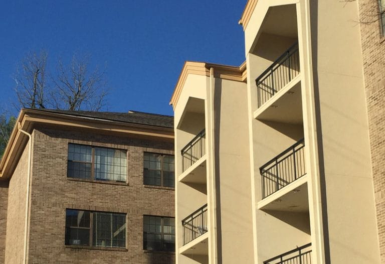 Exterior view of a residential building with balconies