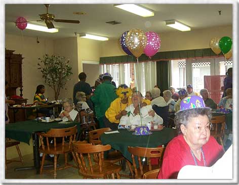 Residents celebrating in a decorated common area