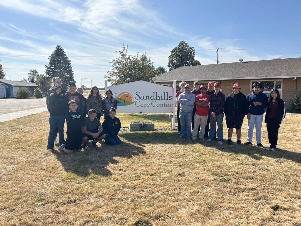 Group photo of staff and students at the care center