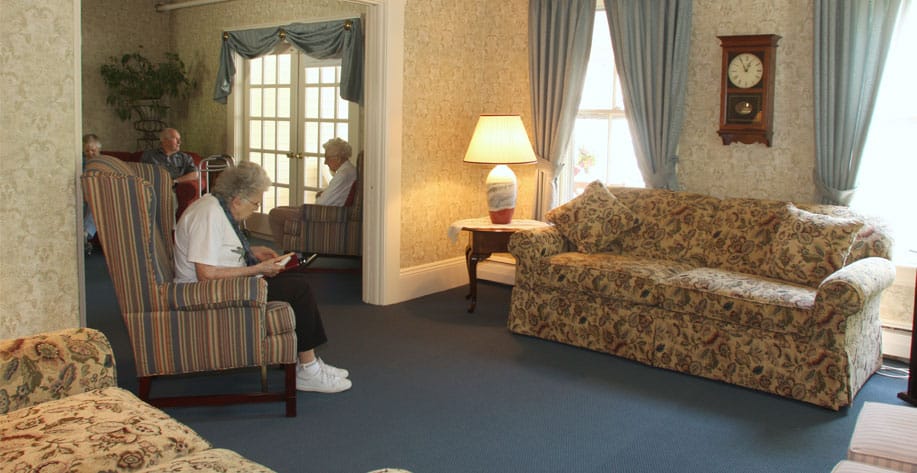 Residents socializing in a cozy common area