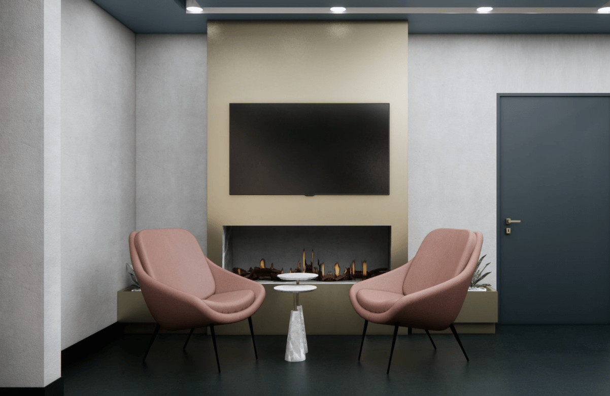 Modern common area with seating and a fireplace