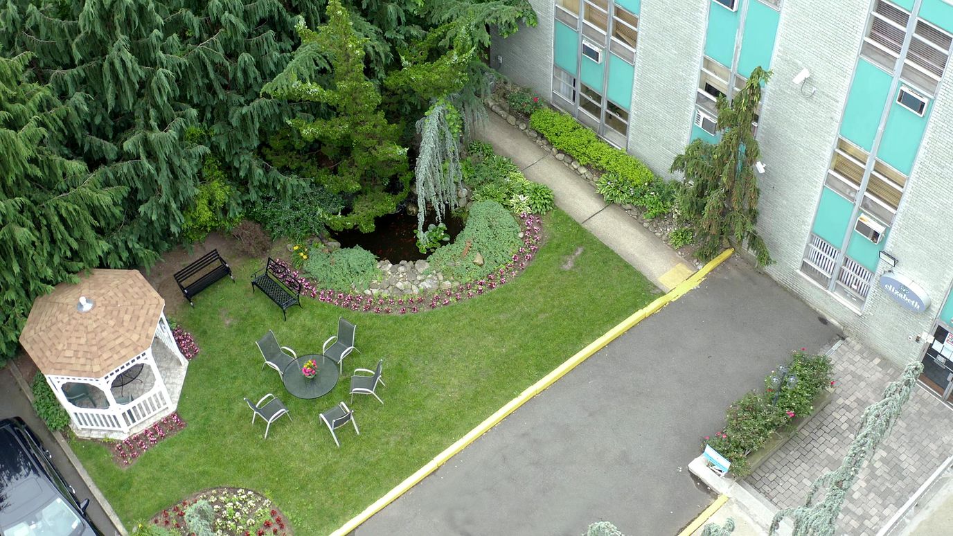 Aerial view of the facility garden and seating area.