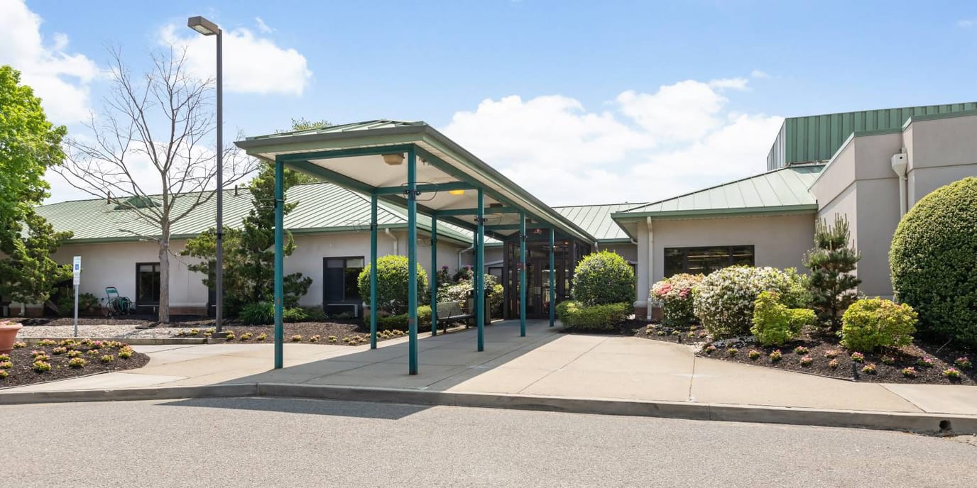Exterior view of a senior living facility entrance