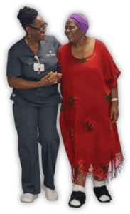 Four Seasons Nursing and Rehabilitation Center, Nursing Home in Brooklyn, NY — Two women smiling and interacting in casual clothing